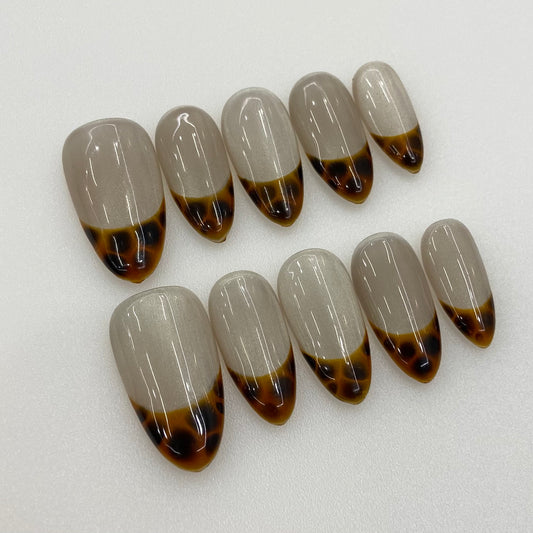 French Classic gold press-on nails flat lay | French Classic nail inspo