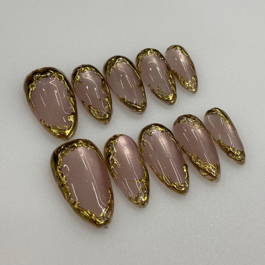 Chrome Metallic gold press-on nails flat lay | Chrome Metallic nail inspo