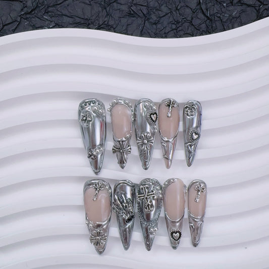 Gothic silver press-on nails flat lay | Gothic nail inspo