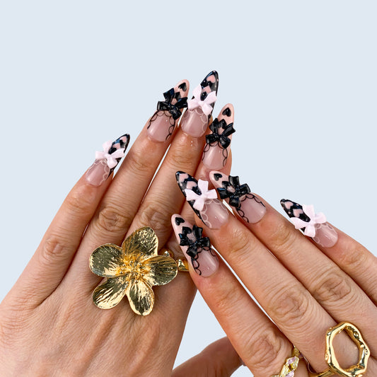 Gothic black press-on nails on hand | Gothic nail inspo