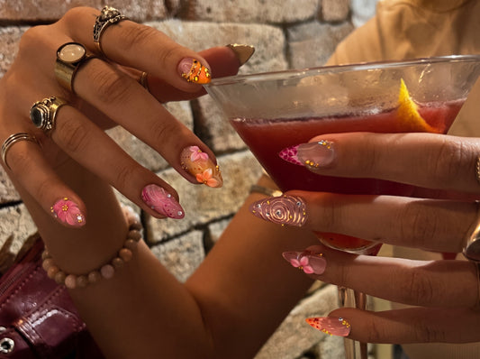 Golden Reef Siren handcrafted 3D sculpted gel press-on nails catching directional evening light with visible shadows 