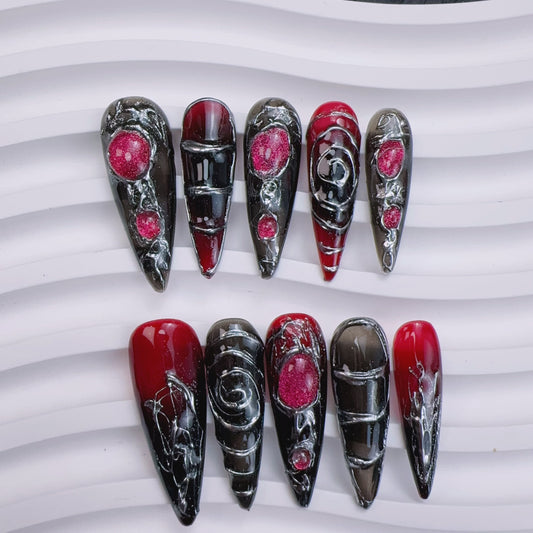 Blood cat eye chrome stiletto nail