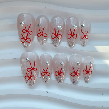 Almond shape cat eye red bow nail