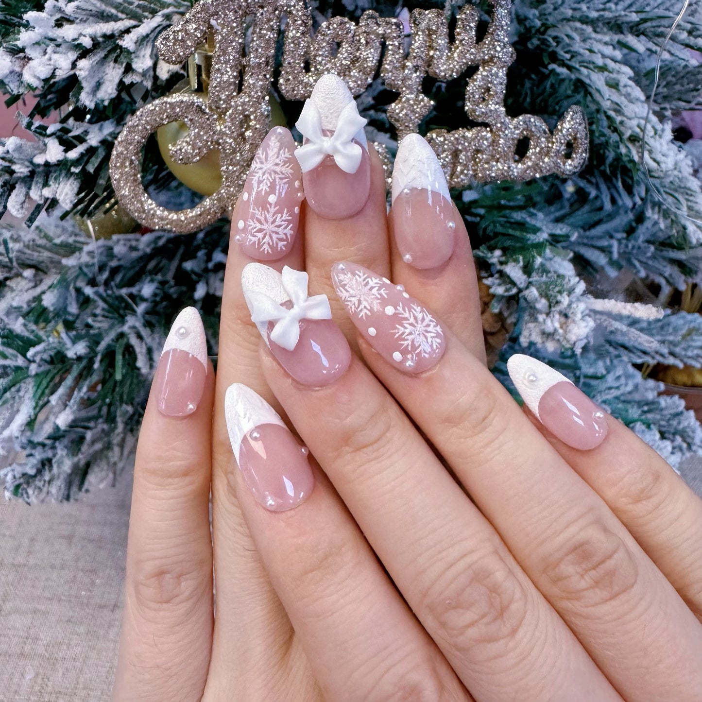 Almond shape white french tip snowflake nail