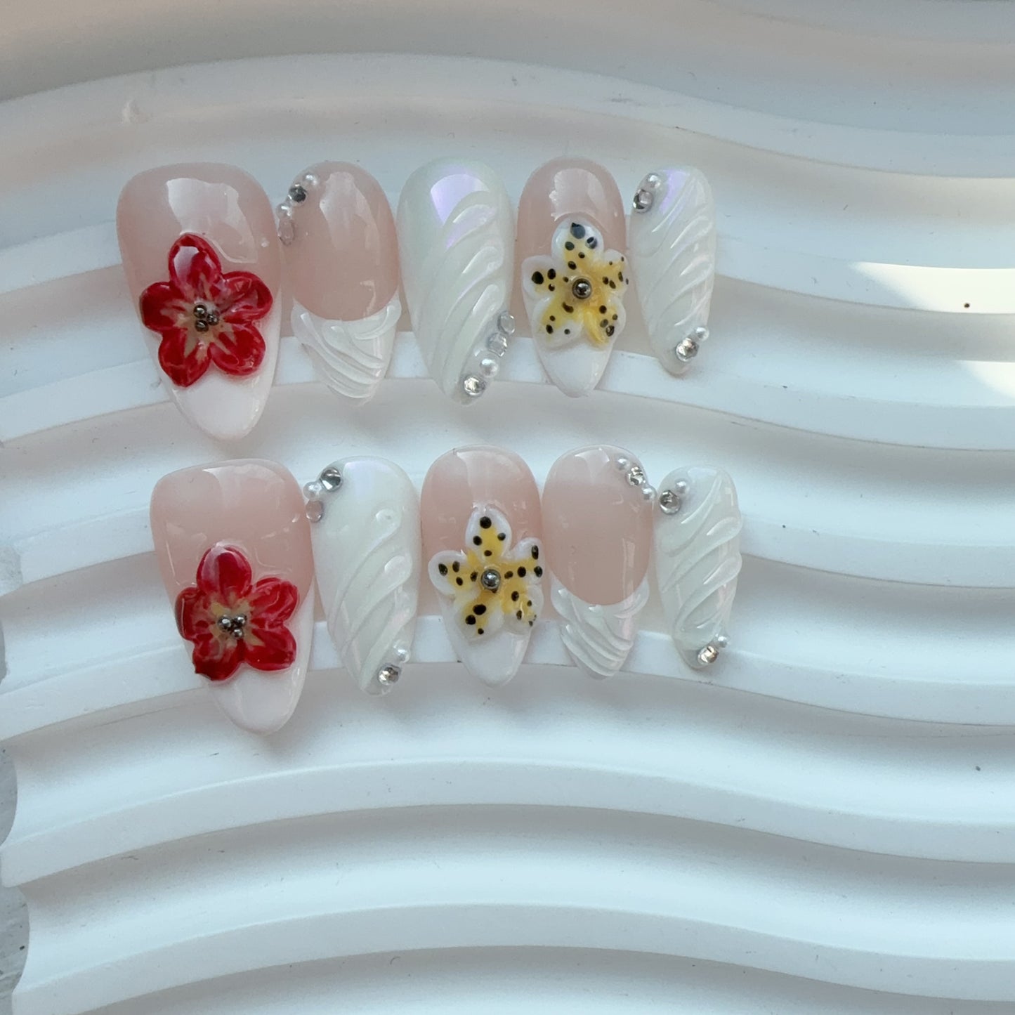 Almond white red flower nail