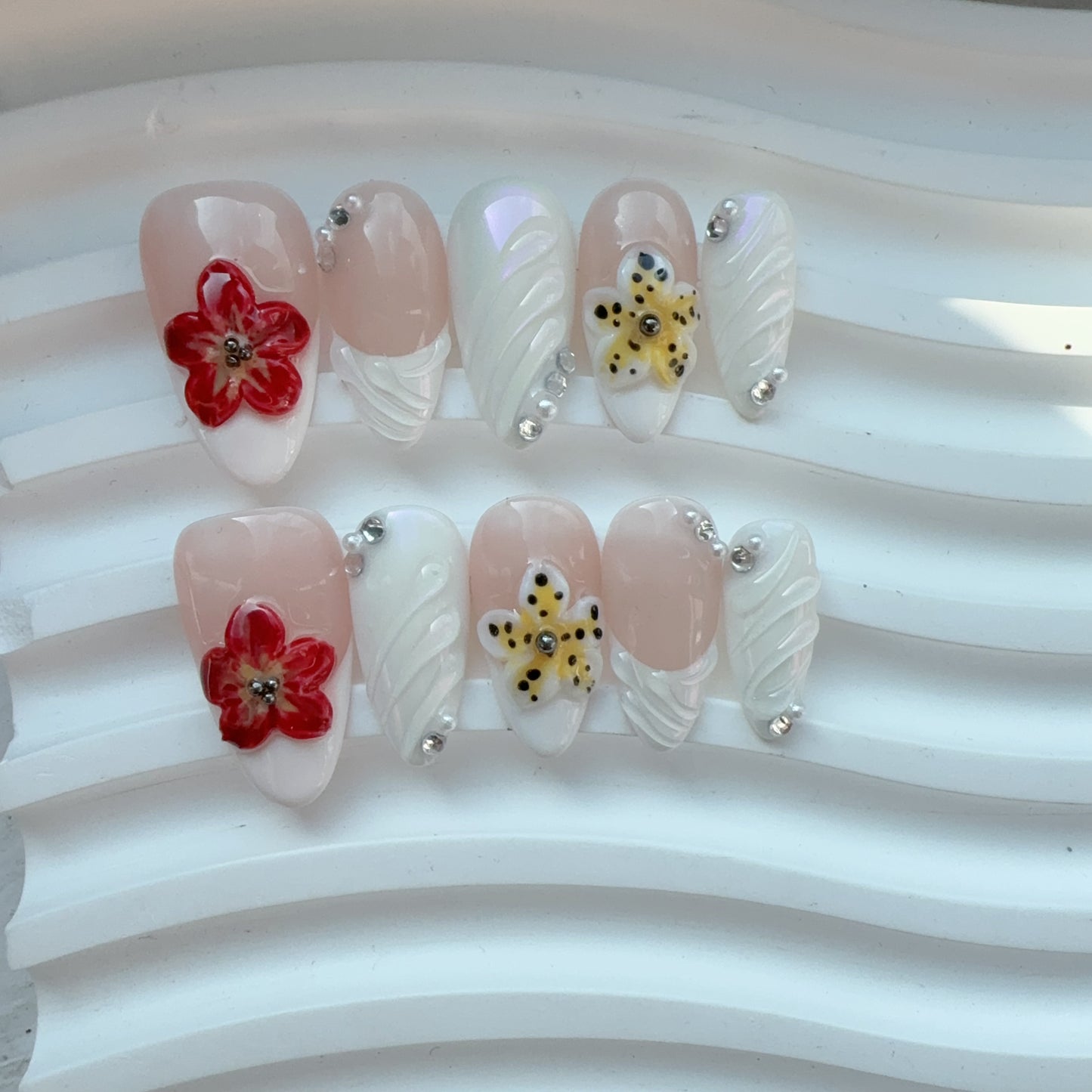 Almond white red flower nail