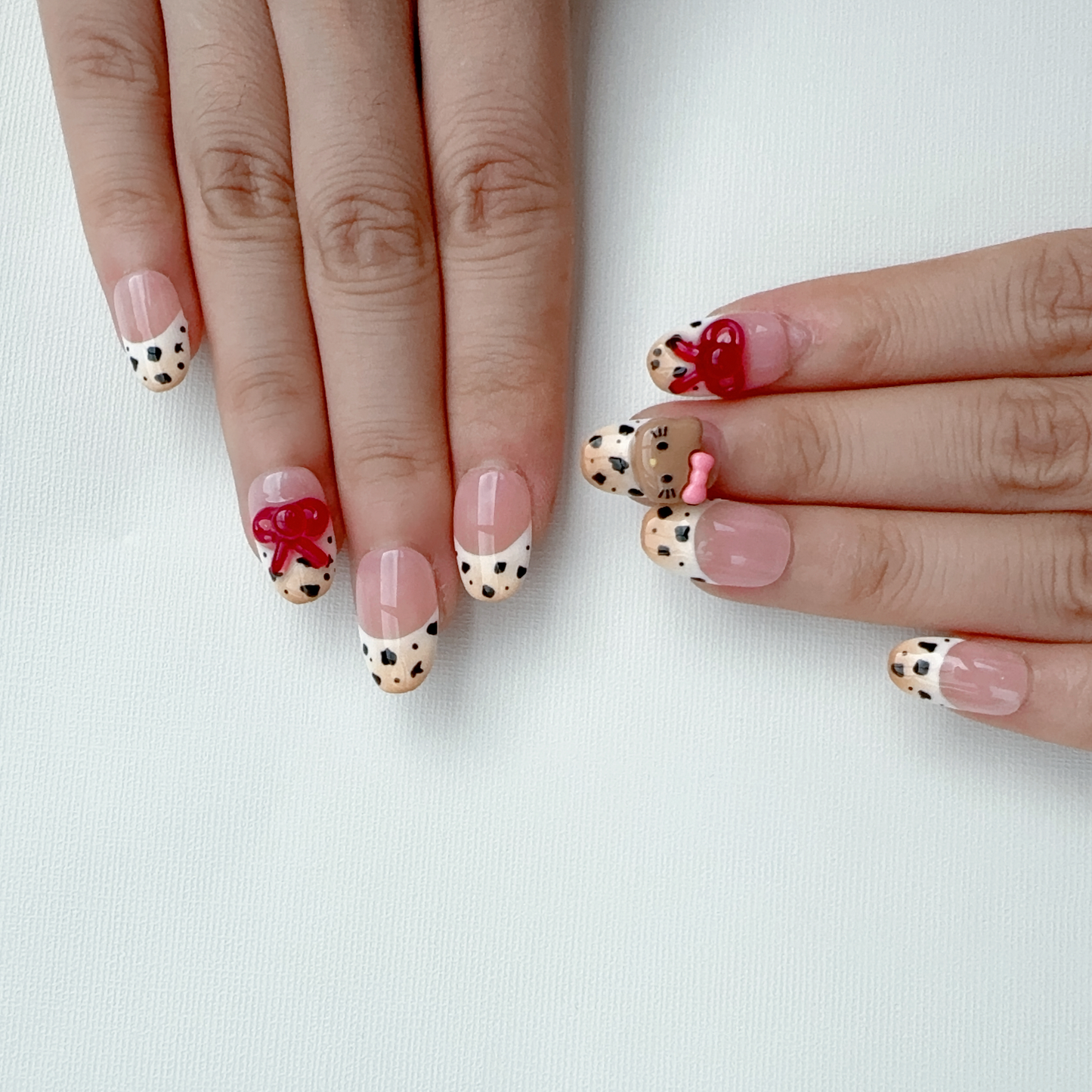 Medium oval leopard print hellokitty nail