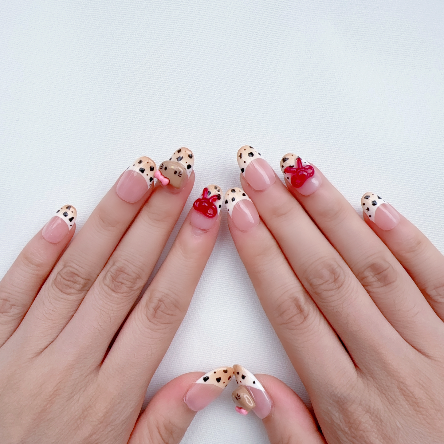 Medium oval leopard print hellokitty nail