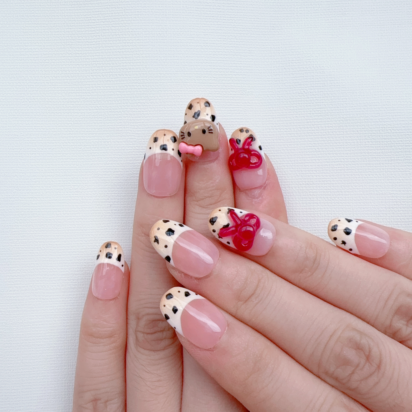 Medium oval leopard print hellokitty nail