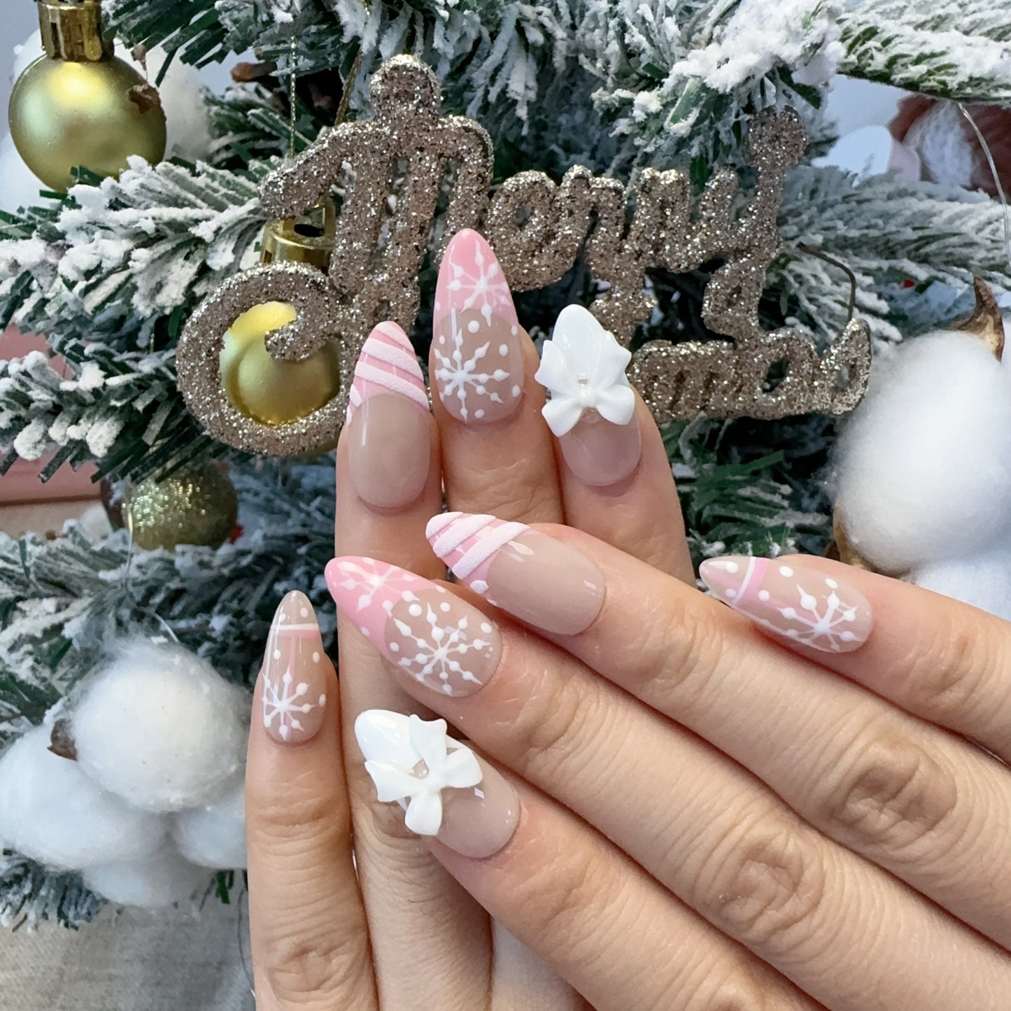 Almond shape pink french snowflake nail