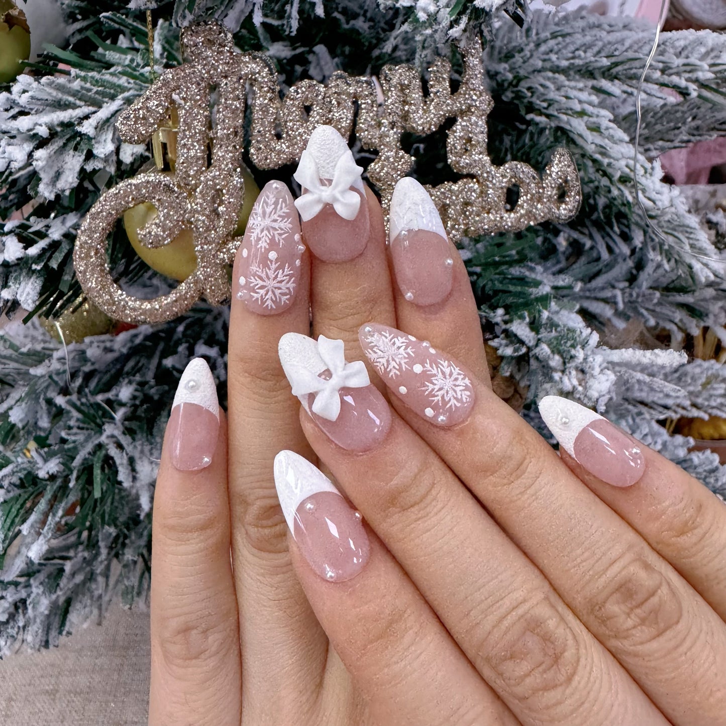 Almond shape white french tip snowflake nail