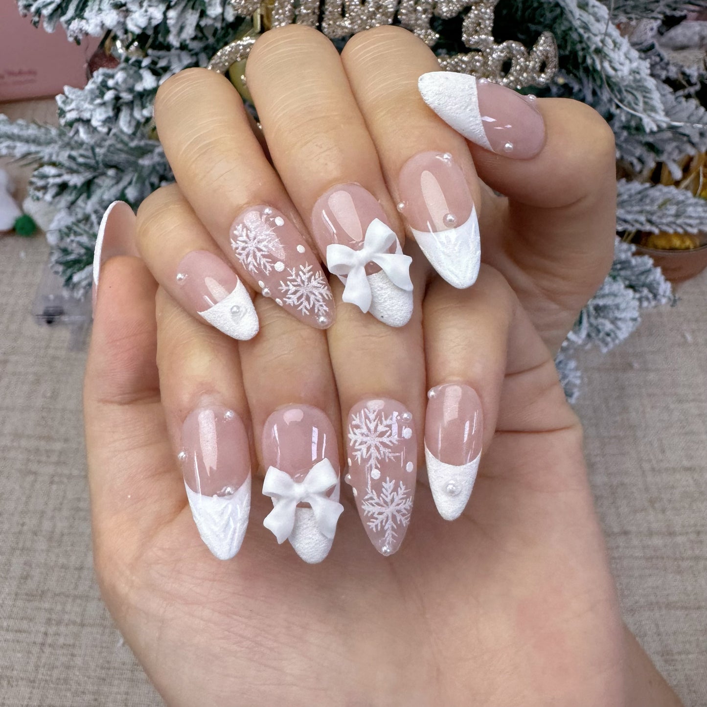 Almond shape white french tip snowflake nail