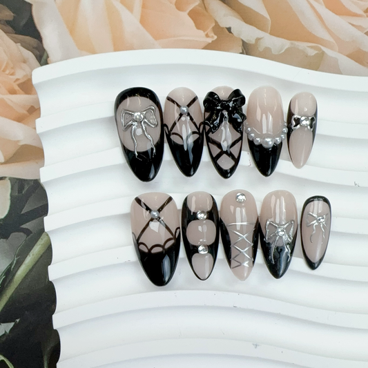 The Midnight Coquette handmade press-on nails — medium almond set in black French bow | Fullovenail