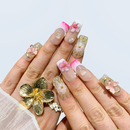 Coquette soft pink press-on nails on hand | Coquette nail inspo
