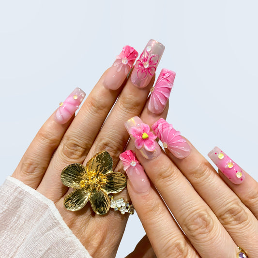 Floral Garden pink press-on nails on hand | Floral Garden nail inspo