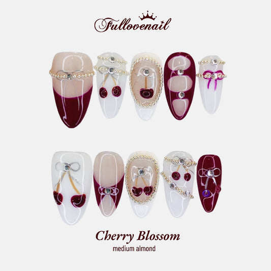 Cherry Bow handmade press-on nails — medium almond set in red and 3D ribbon bows | Fullovenail