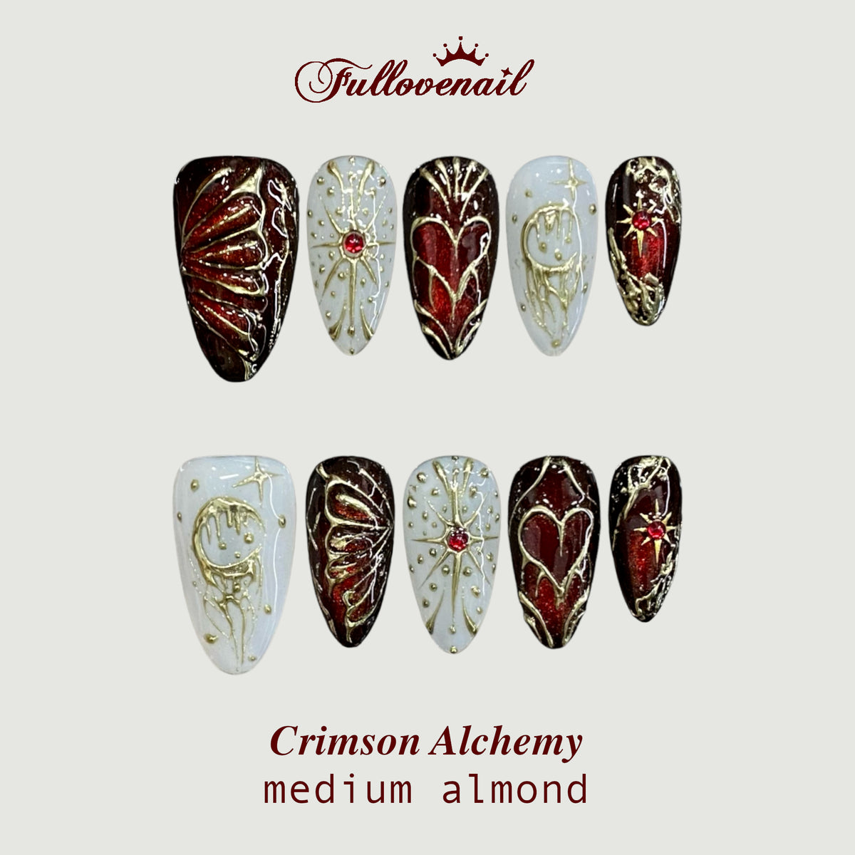Crimson Alchemy handmade press-on nails in medium almond featuring 3D gold baroque filigree, celestial moons, and gothic hearts