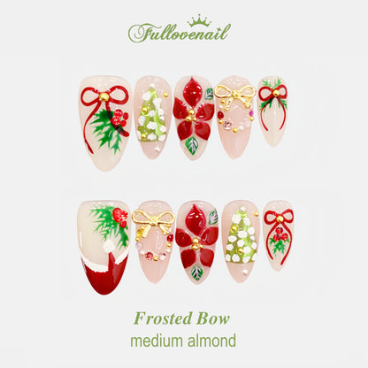 Frosted Bow almond press-on nails with 3D red poinsettia and Christmas tree art