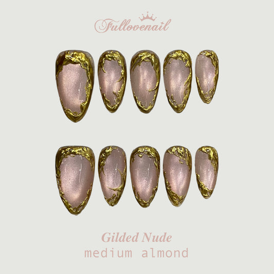 Gilded Nude handmade press-on nails — medium almond set in gold and handcrafted art detailing | Fullovenail