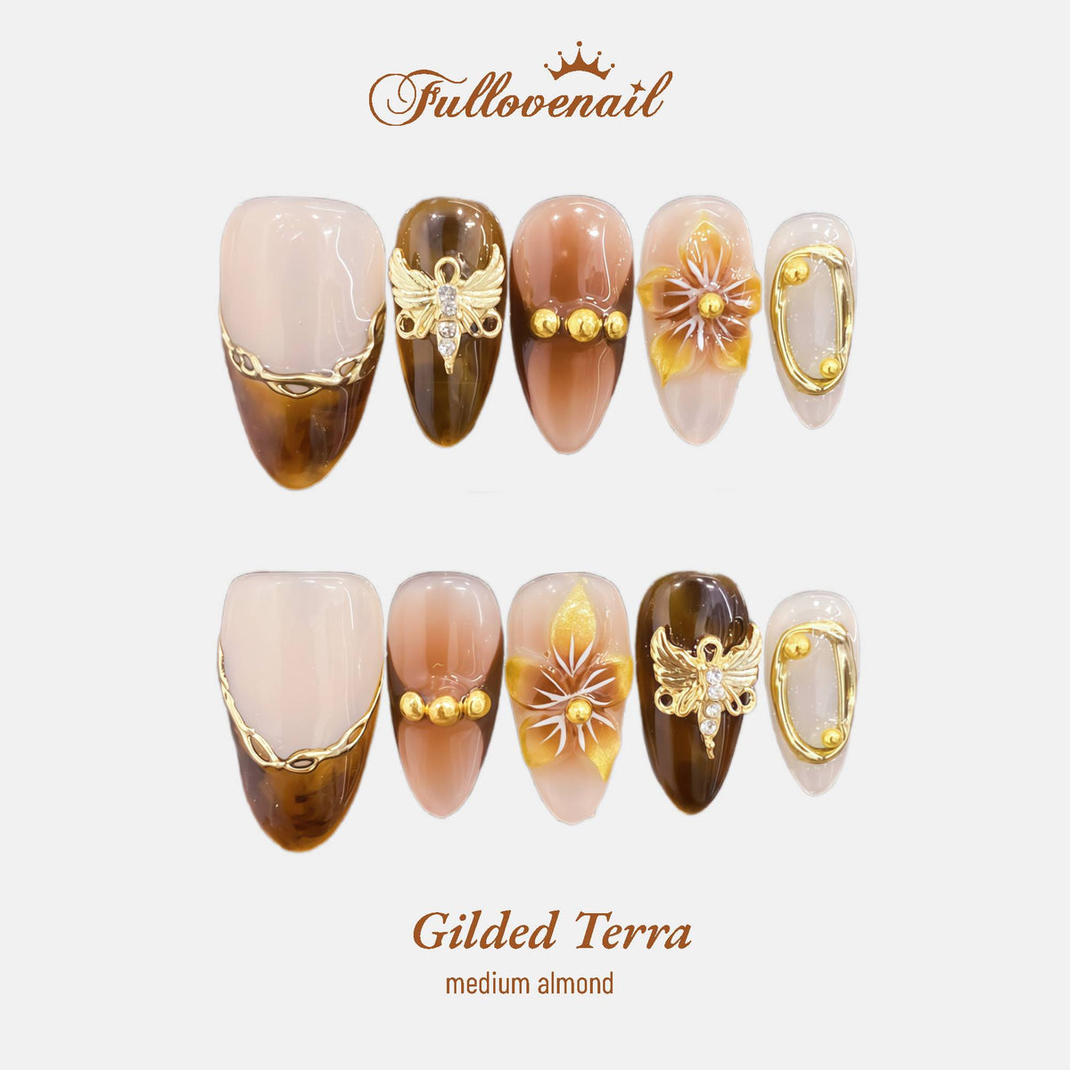 Gilded Terra almond press-on nails with 3D gold butterflies and sculpted amber flowers