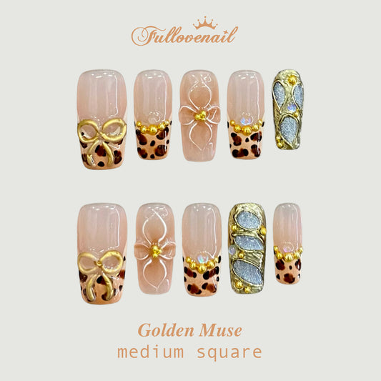 Golden Muse square press-on nails with 3D metallic bow and leopard French tips