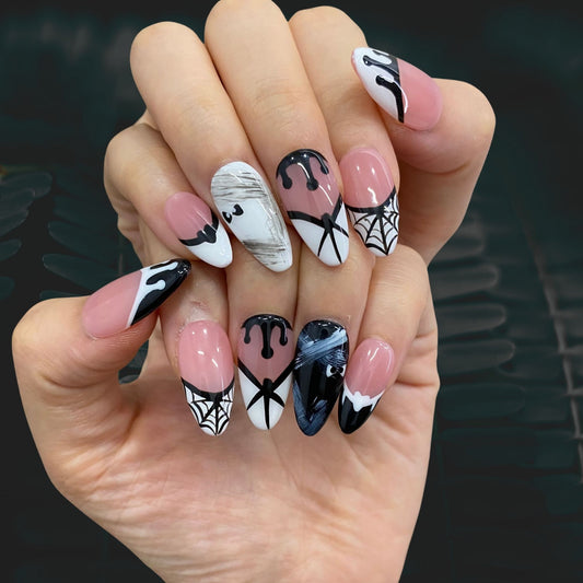 Gothic black press-on nails on hand | Gothic nail inspo