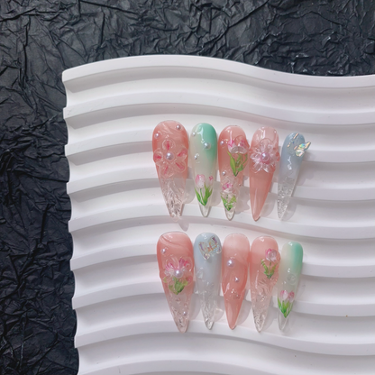 Ceramic tray flat lay of Blush Bloom nails showing 3D tulips and water ripples