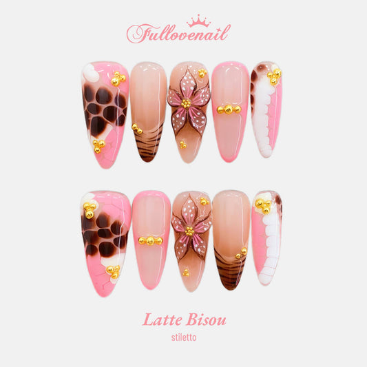 Latte Bisou handmade press-on nails — long stiletto set in nude brown and handcrafted art detailing | Fullovenail