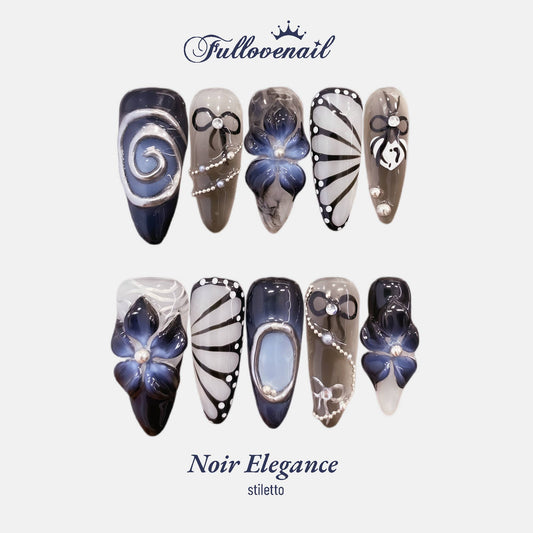 Noir Elegance stiletto press-on nails featuring dark 3D flowers and silver chrome art