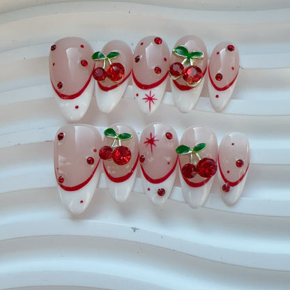 Full 10-piece set display of Velvet Cherry 3D fruit French press-on nails