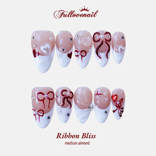 Ribbon Bliss almond press-on nails with 3D red bows and white French tips