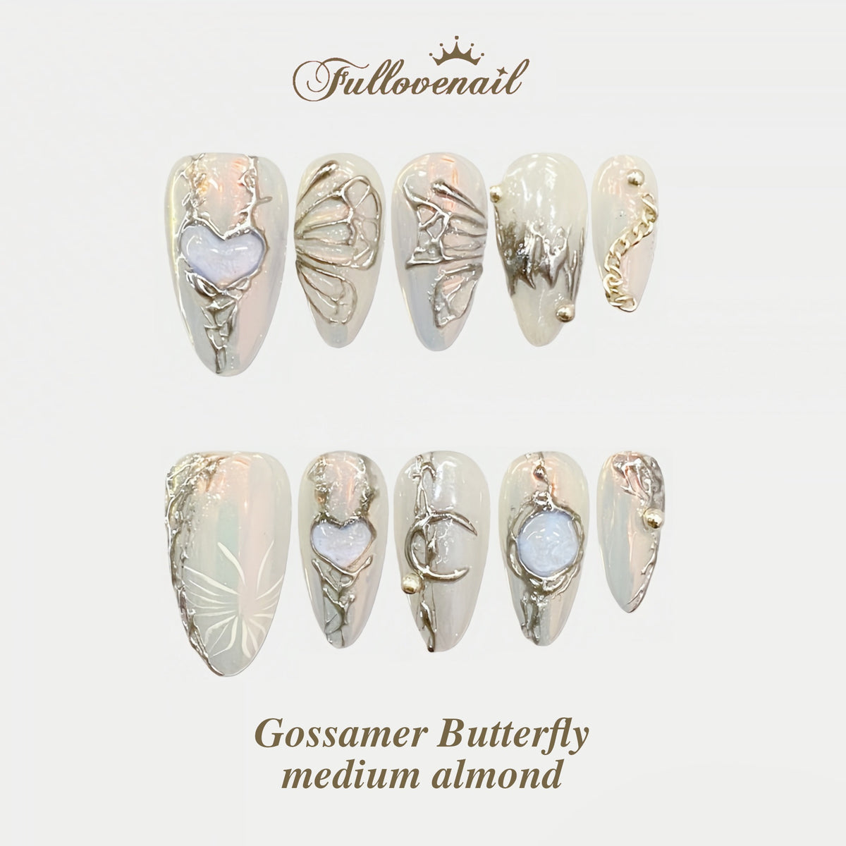 Gossamer Butterfly almond press-on nails with 3D liquid silver wings and heart frames