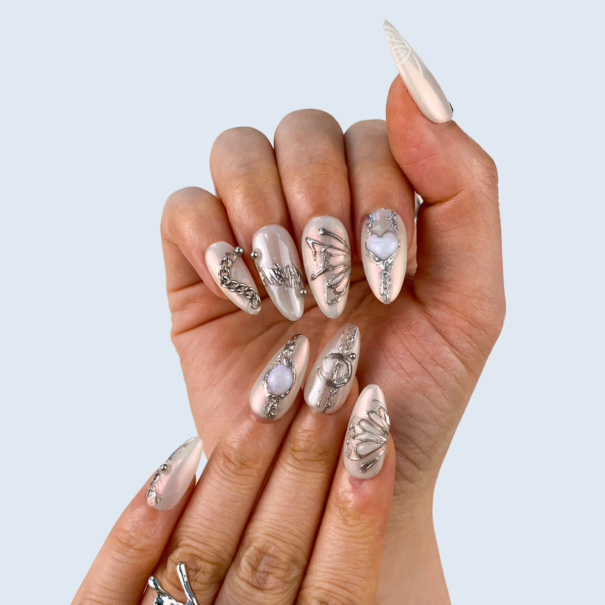 Full set wear look of Gossamer Butterfly pearlescent chrome almond press-on nails