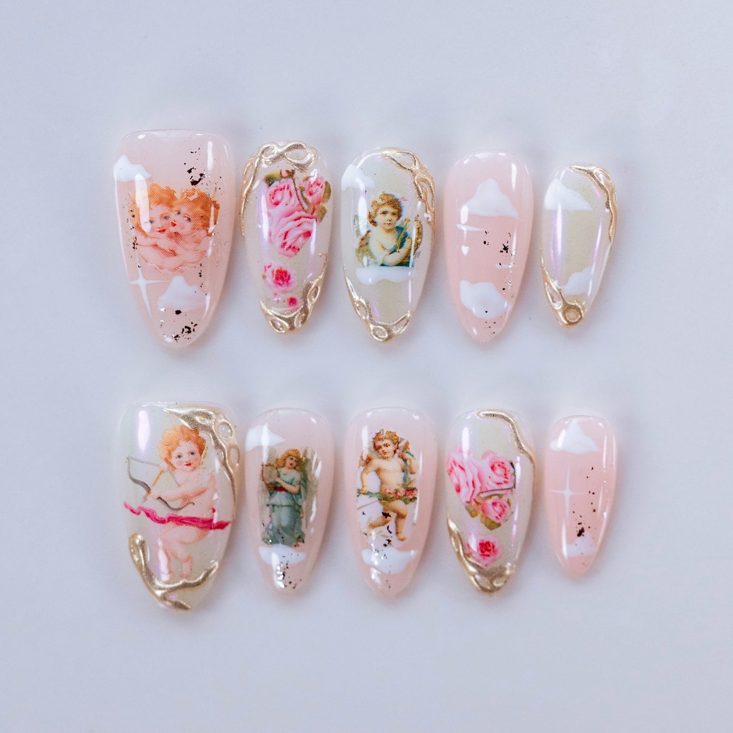 Angel's Love Story handmade press-on nails — medium almond set in cherry red and angel charm accents | Fullovenail