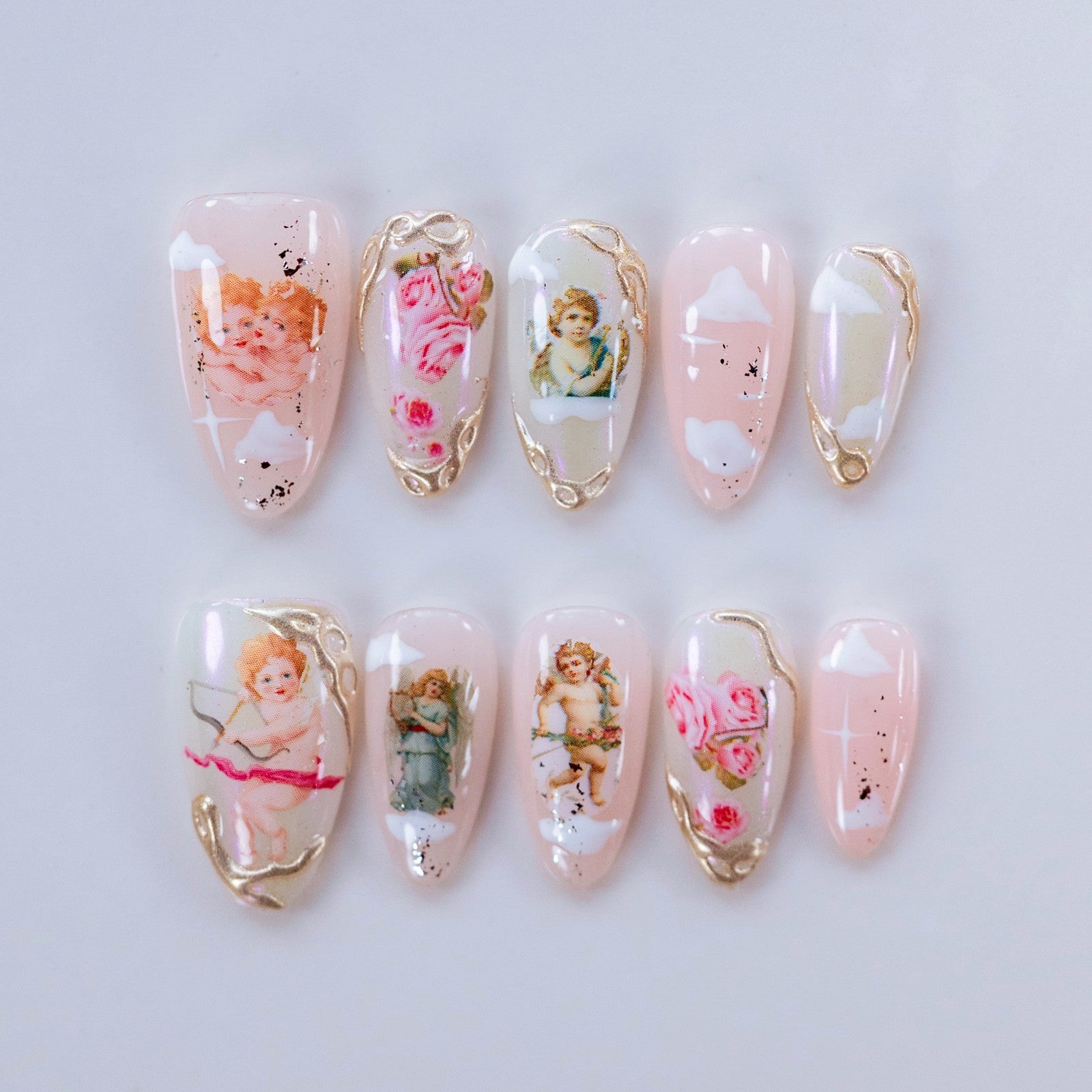 Angel's Love Story handmade press-on nails — medium almond set in cherry red and angel charm accents | Fullovenail