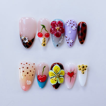 Royal Bloom nail art flat lay close-up showing 3D sculpted floral petals on almond nails