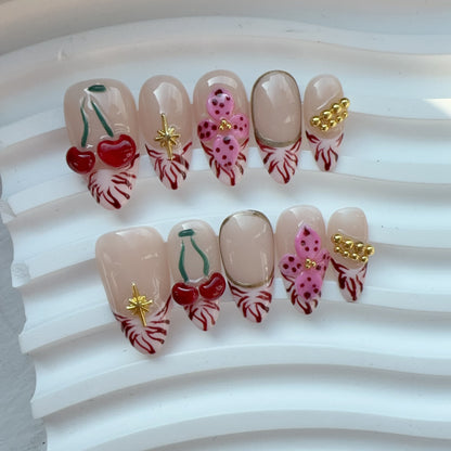 Ceramic tray flat lay of Royal Petals nails showing 3D floral and cherry art