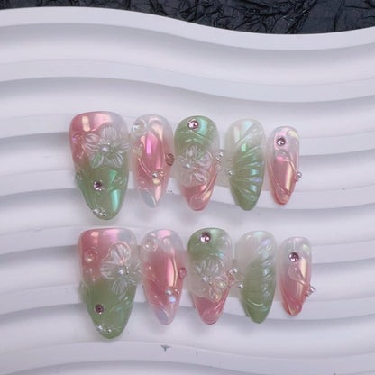 Ceramic tray flat lay of Ocean's Bloom nails showing 3D floral and seashell design