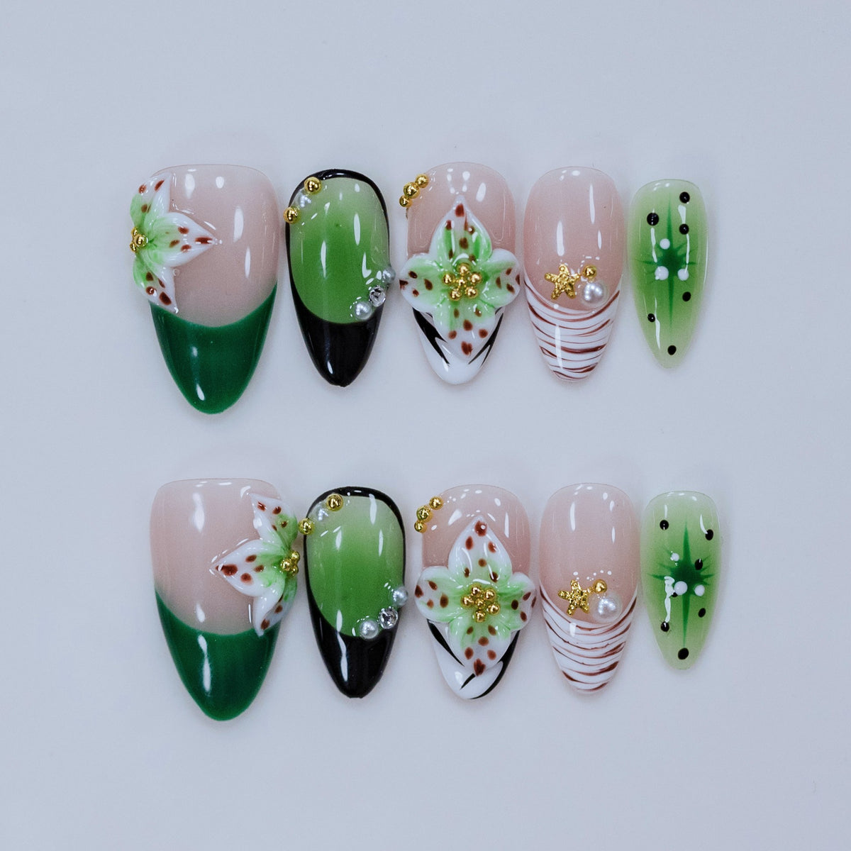 Mint Floral Whisper almond press-on nails with 3D blooming petals and green French tips