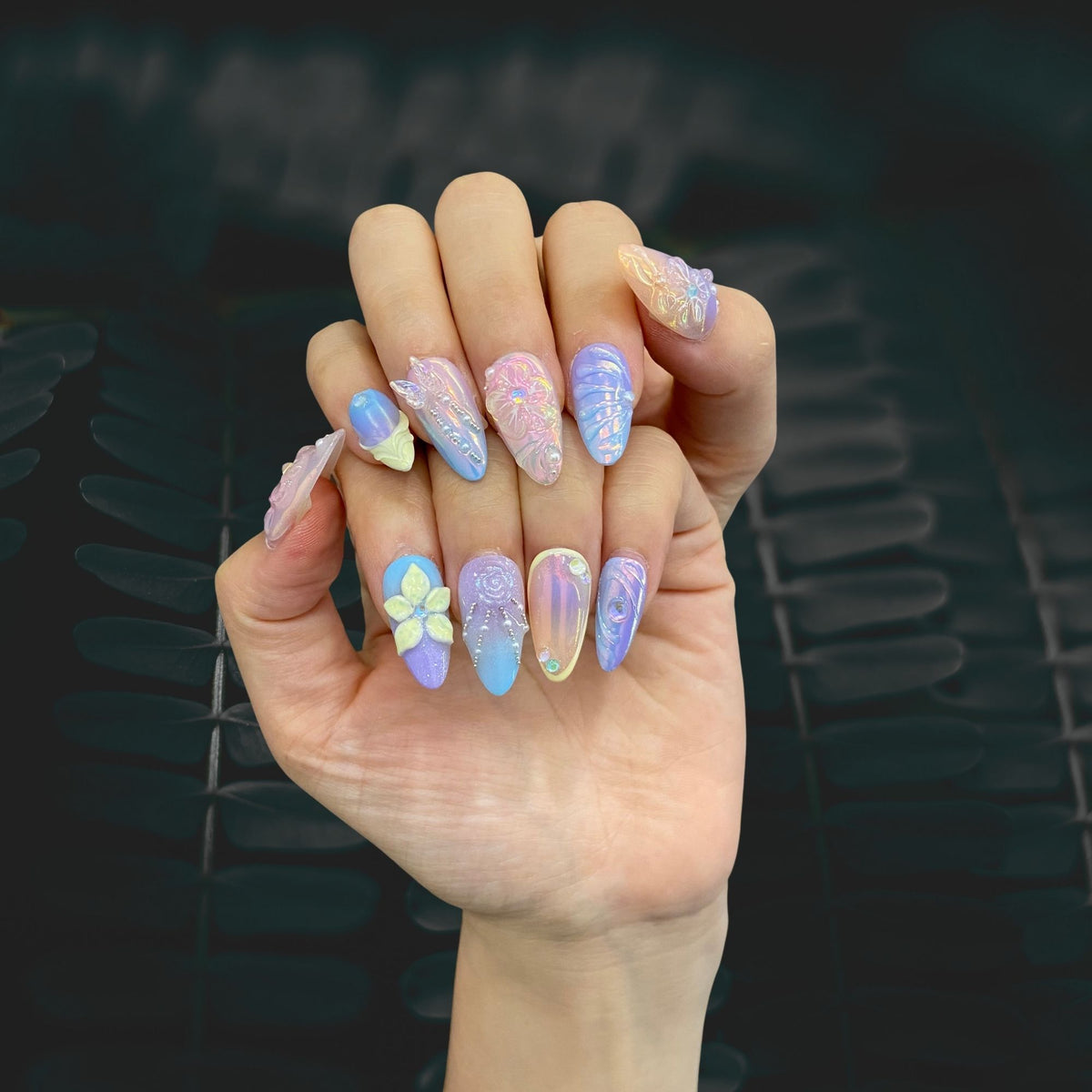 Salon quality Sugar Blossom reusable gel press-on nails with custom sizing on natural hands