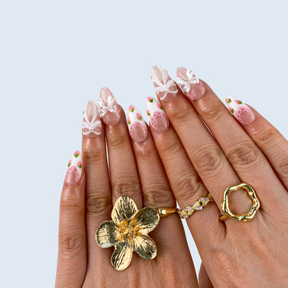 Handcrafted pink gel fake nails in natural light for everyday wear and special occasions