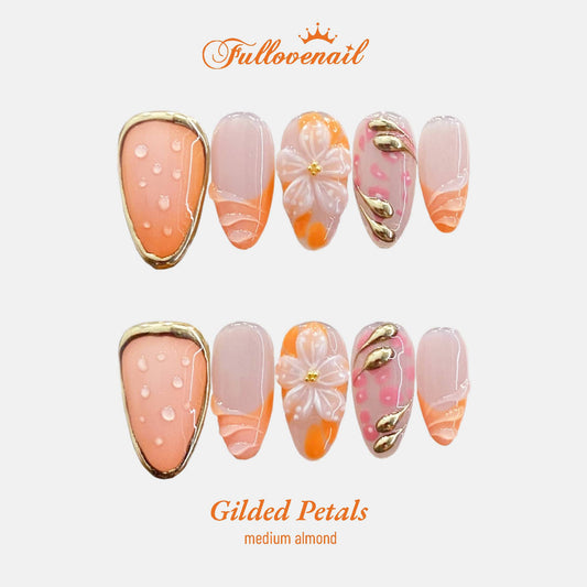 Gilded Petals handmade press-on nails — medium almond set in gold and 3D sculpted floral petals | Fullovenail