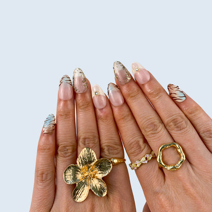 Handcrafted aurora lilac gel fake nails in natural light for everyday wear and special occasions