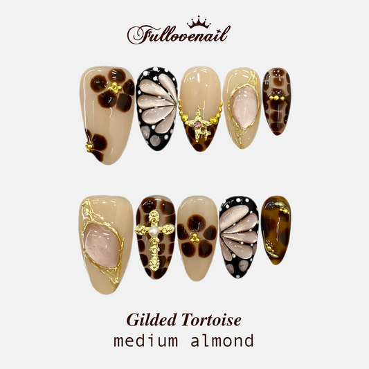Gilded Tortoise handmade press-on nails — medium almond set in gold and handcrafted art detailing | Fullovenail