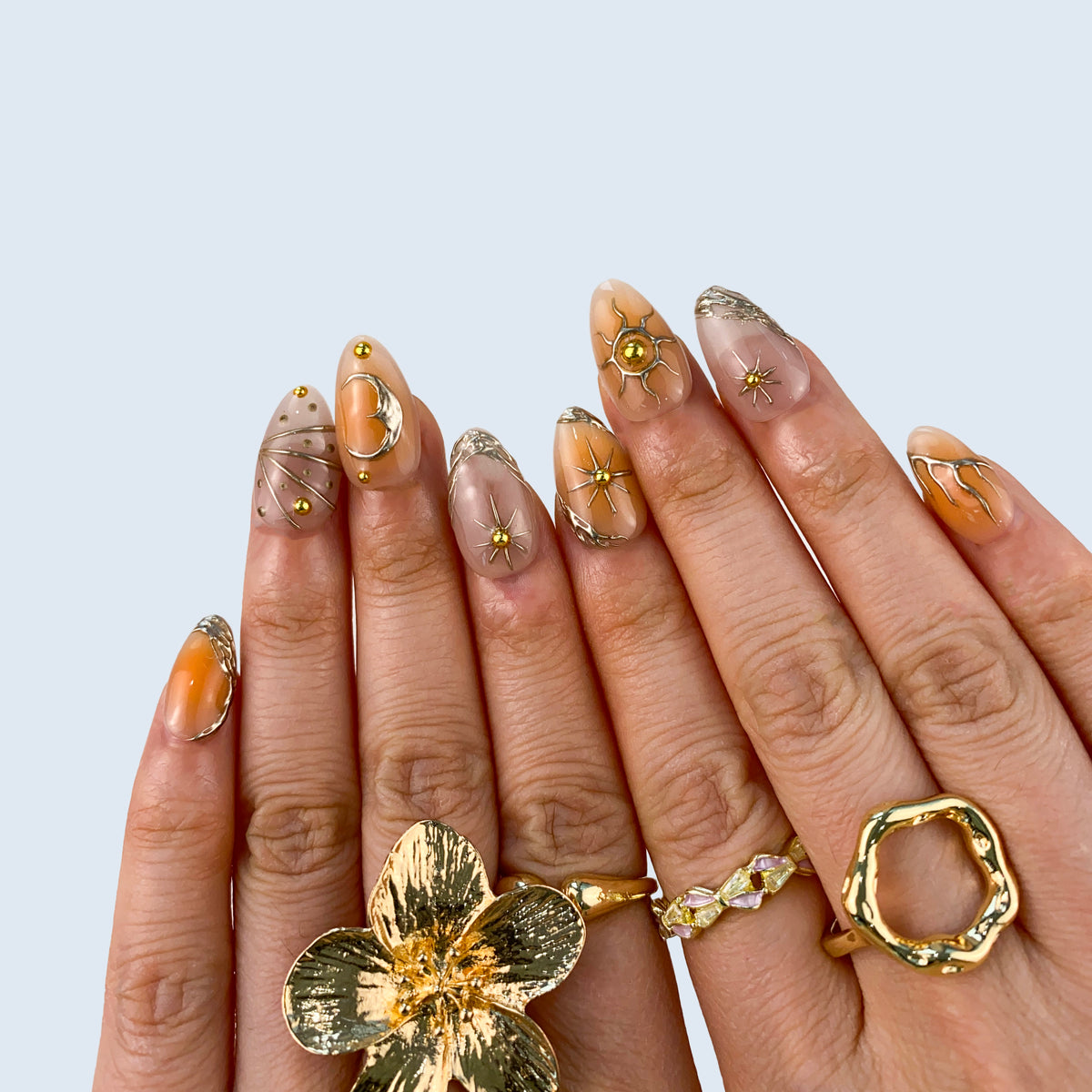 Salon quality Stellar Glow reusable gel press-on nails with custom sizing on natural hands