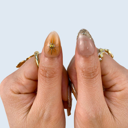 Luxury galaxy cat eye shimmer gel manicure with magnetic shimmer detailing on hands close up