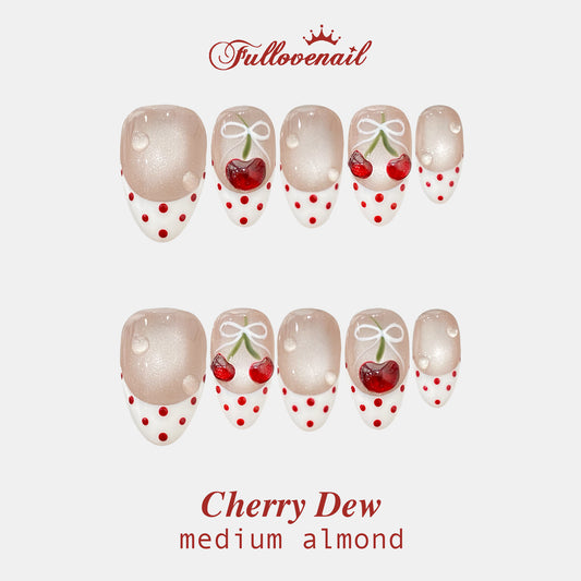 Cherry Dew medium almond press-on nails with 3D cherries and cat-eye French tips