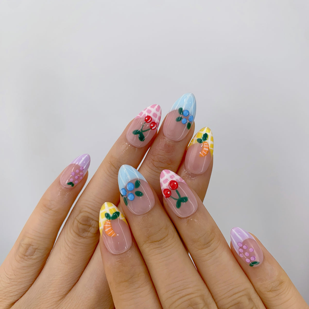 Sorbet Orchard nail art close-up showing handcrafted art detailing on almond nails