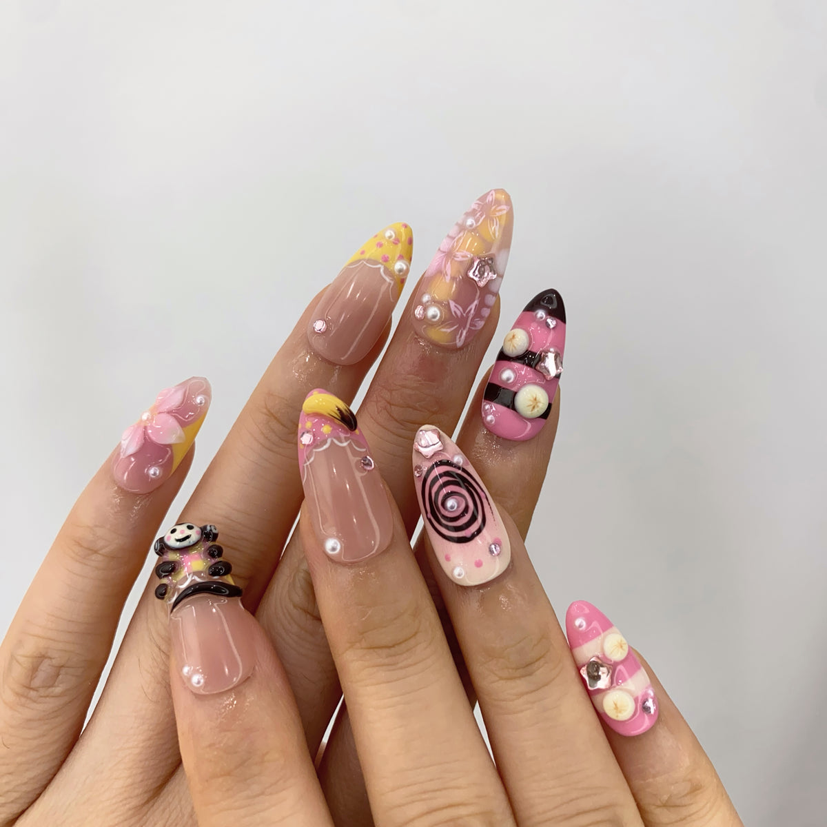 Full set wear look of Harajuku Sugar Y2K kawaii almond press-on nails on hands