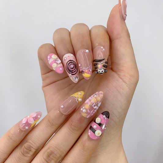Kawaii rainbow candy pastel press-on nails on hand | Y2K Harajuku aesthetic nail inspo